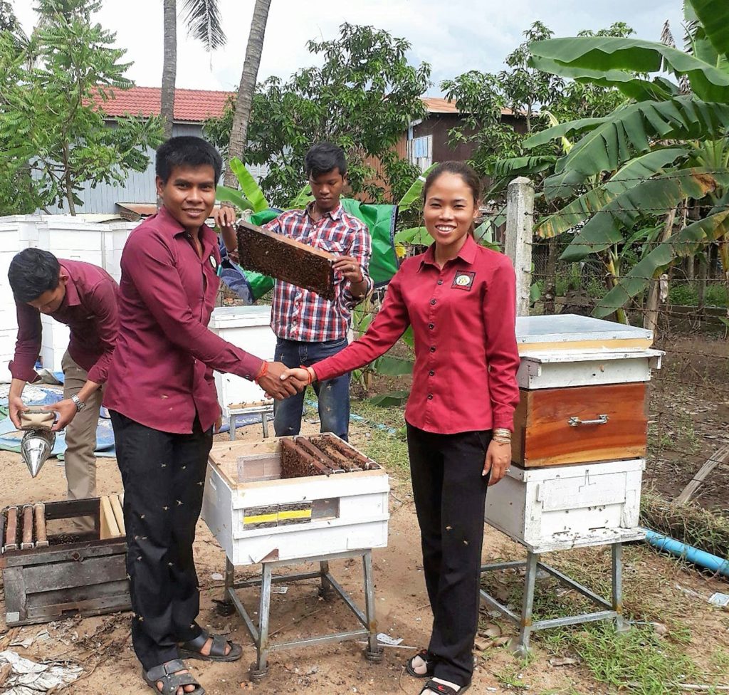 Choub Sokheng receiving his Bees